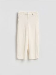 Spodnie z wiskozą - złamana biel. Spodnie materiałowe damskie Reserved, l, bez wzorów, z tkaniny. Za 159.99 zł.