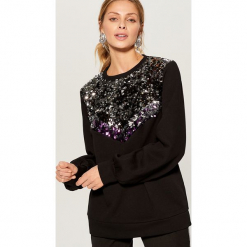 Bluza z cekinową aplikacją - Czarny. Bluzy damskie marki KALENJI. Za 99.99 zł.