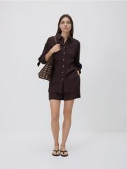 Bawełniane szorty - ciemnobrązowy. Brązowe szorty damskie Reserved, l, bez wzorów, z bawełny. Za 69.99 zł.