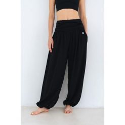 Spodnie haremki do jogi Moonholi Alladin z szerokimi nogawkami. Czarne spodnie materiałowe damskie MOONHOLI, m, bez wzorów. Za 389.00 zł.