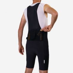Spodenki rowerowe gravelowe Triban Gravel 500 Cargo na szelkach. Czarne szorty męskie RIVERSIDE, l, bez wzorów, z elastanu. Za 179.99 zł.