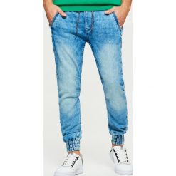 Jeansy SLIM JOGGER - Niebieski. Niebieskie jeansy męskie Cropp. Za 129.99 zł.