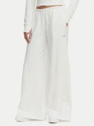 Tommy Jeans Spodnie dresowe Metallic Logo DW0DW22735 Biały Wide Leg. Białe jeansy damskie Tommy Jeans. Za 409.99 zł.