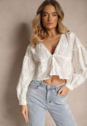 Biała Koszula Oversize z Bawełny Ozdobiona Haftowanymi Kwiatami Valiera. Białe bluzki damskie Renee, l, bez wzorów, z bawełny, eleganckie, bez kołnierzyka, bez ramiączek. Za 89.99 zł.