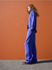 Spodnie w stylu piżamowym - niebieski. Niebieskie spodnie materiałowe damskie Reserved, l, bez wzorów, z tkaniny. W wyprzedaży za 29.99 zł.