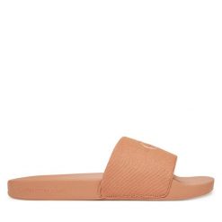 Klapki Calvin Klein Jeans. Pomarańczowe klapki damskie Calvin Klein Jeans, bez wzorów, z jeansu, bez obcasa. Za 109.99 zł.