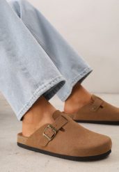 Jasnobrązowe Klapki Typu Chodaki z Zamszu Naturalnego z Klamrą Meridnore. Brązowe klapki damskie Renee, bez wzorów, z materiału, eleganckie, bez obcasa, na płaskiej podeszwie. Za 159.99 zł.