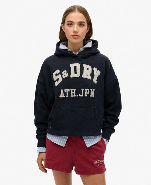 Bluza z kapturem Ath Ess Appliq Relaxed. Niebieskie bluzy damskie Superdry., z aplikacjami, z bawełny, z kapturem. Za 298.85 zł.