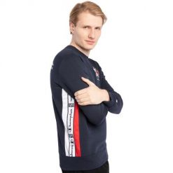 Bluza męska Champion Crewneck 216894. Niebieskie bluzy męskie Champion, na jesień, m, bez wzorów, z bawełny, bez kaptura. Za 315.10 zł.