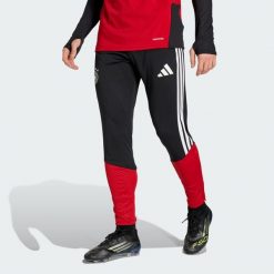 Spodnie Germany 26 Tiro Training. Czarne spodnie sportowe męskie Adidas, bez wzorów, do piłki nożnej. Za 279.00 zł.