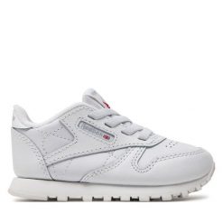 Sneakersy Reebok. Białe trampki i tenisówki chłopięce Reebok, bez wzorów, bez zapięcia. Za 109.99 zł.