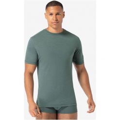 Koszulka termoaktywna z krótkim rękawem męska SUPER.NATURAL. Zielone koszulki sportowe męskie super.natural, na lato, m, bez wzorów, z materiału, bez kołnierzyka, bez ramiączek. Za 299.99 zł.