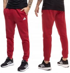 Adidas Spodnie męskie adidas Essentials Feelcozy czerwone KC0915 L. Czerwone spodnie sportowe męskie Adidas, l, bez wzorów. Za 184.67 zł.