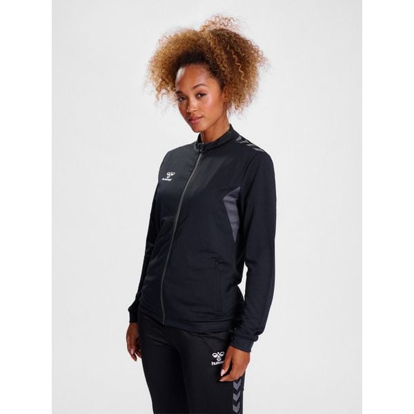 HUMMEL bluza sportowa rozpinana AUTHENTIC PL ZIP. Czarne bluzy damskie Hummel, bez wzorów, bez kaptura. Za 149.99 zł.