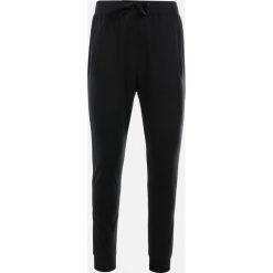 Czarne Spodnie Dresowe Joggery Analía. Czarne spodnie sportowe męskie Born2be, l, bez wzorów, z dresówki. Za 39.99 zł.