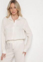 Biała Klasyczna Koszula z Wiskozy Melriza. Białe bluzki damskie Born2be, l, bez wzorów, z jeansu, biznesowe, bez kołnierzyka, bez ramiączek. Za 119.99 zł.
