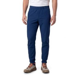 Męskie elastyczne spodnie do biegania w terenie Siroko Tor Blue. Niebieskie spodnie sportowe męskie SIROKO, l, bez wzorów, z materiału, do biegania. Za 296.00 zł.
