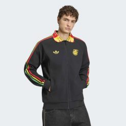 Wyjazdowa bluza reprezentacyjna Jamajka x Bob Marley. Czarne bluzy męskie Adidas, l, bez wzorów, bez kaptura. Za 529.00 zł.