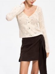 Crochetowy kardigan w autorski wzór - kremowy. Białe kardigany damskie Reserved, l, bez wzorów, z bawełny. Za 279.99 zł.