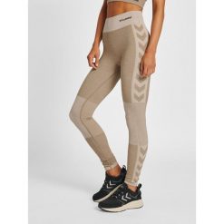 Damskie legginsy mid-rise Hummel Clea. Szare legginsy sportowe damskie Hummel, m, bez wzorów, z dzianiny, z standardowym stanem, na fitness i siłownię. Za 217.00 zł.