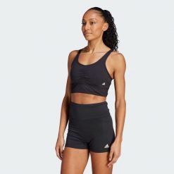 Biustonosz Essentials Medium-Support. Czarne obuwie sportowe damskie Adidas, bez wzorów, z materiału, na fitness i siłownię. W wyprzedaży za 140.65 zł.