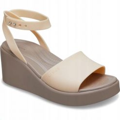 Sandały dla Kobiet Crocs Brooklyn Ankle Strap Wedge. Brązowe sandały damskie Crocs, bez wzorów, z materiału, bez obcasa, na koturnie, bez zapięcia. Za 209.99 zł.