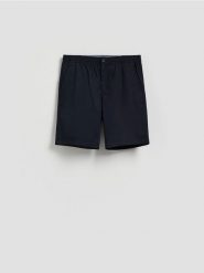 Szorty chino regular - granatowy. Niebieskie spodnie materiałowe męskie Reserved, l, bez wzorów, z bawełny. Za 129.99 zł.