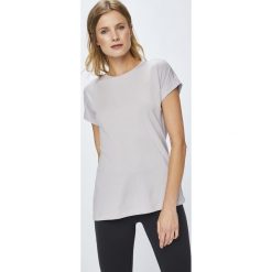 Reebok - Top. Topy damskie marki Reebok. W wyprzedaży za 89.90 zł.