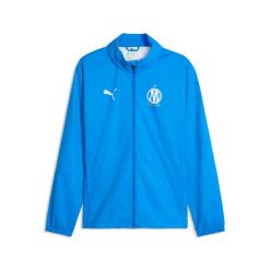 Kurtka przeciwdeszczowa Training OM 2026/27. Niebieskie kurtki męskie Puma, xl, bez wzorów, bez kaptura. Za 386.00 zł.