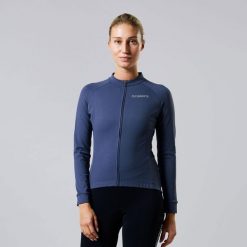 Damska koszulka kolarska z długim rękawem Essential Thermofleece Winter. Niebieskie bluzy sportowe damskie ACELERA, bez wzorów, z polaru, bez kaptura, rowerowe. W wyprzedaży za 211.46 zł.