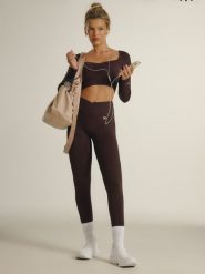 4F Legginsy treningowe damskie 4F x Anna Lewandowska - brązowe L. Brązowe legginsy sportowe damskie 4f, l, bez wzorów, z materiału, z podwyższonym stanem, długie, do biegania. Za 129.99 zł.