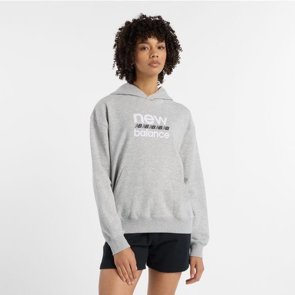 Bluza damska New Balance WT51519AG – szara. Szare bluzy damskie New Balance, l, bez wzorów, z bawełny, bez kaptura. Za 249.99 zł.