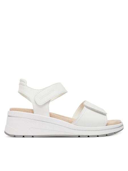 Caprice Sandały 9-28305-46 Biały. Białe sandały damskie Caprice, bez wzorów, ze skóry, bez obcasa, na koturnie, bez zapięcia. Za 228.99 zł.