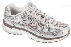 Buty sportowe Sneakersy damskie, W P-6000. Białe obuwie sportowe damskie Nike, bez wzorów, z materiału, trekkingowe. Za 587.60 zł.