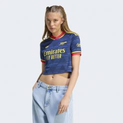 Krótka koszulka wyjazdowa Arsenal FC 26/27. Niebieskie koszulki sportowe damskie Adidas, m, bez wzorów, z dzianiny, bez kołnierzyka, bez ramiączek, do piłki nożnej, climacool (adidas). Za 369.00 zł.