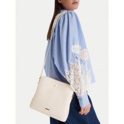 Torebka JENNY. Torebki do ręki damskie Jenny, bez wzorów, klasyczne, bez dodatków. Za 129.99 zł.