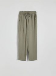 Spodnie jogger z lyocellu - oliwkowy. Zielone spodnie materiałowe damskie Reserved, l, bez wzorów, z lyocellu. W wyprzedaży za 49.99 zł.