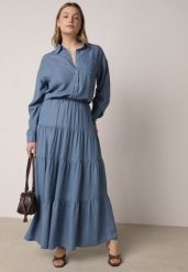 Niebieska Rozkloszowana Spódnica z Lyocellu z Wysokim Stanem i Falbanami Emorithia. Niebieskie spódnice damskie Born2be, bez wzorów, z lyocellu, klasyczne, z podwyższonym stanem, maxi, koszulowe. Za 89.99 zł.