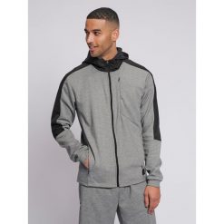 Bluza fitness męska Hummel hmltropper zip z kapturem. Szare buty sportowe męskie Hummel, bez zapięcia, na fitness i siłownię. W wyprzedaży za 239.00 zł.