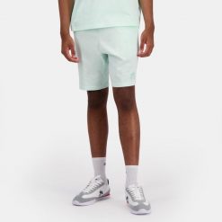 Szorty Le Coq Sportif BAS. Zielone krótkie spodenki sportowe męskie le coq sportif, xs, bez wzorów, z materiału, na fitness i siłownię. Za 275.50 zł.