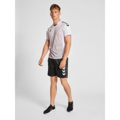 Jersey Hummel hmlcore xk sublimation. Czerwone koszulki sportowe męskie Hummel, na lato, m, bez wzorów, z jersey, bez kołnierzyka, bez ramiączek, na fitness i siłownię. W wyprzedaży za 148.50 zł.