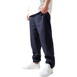 Spodnie Urban Classics basic. Niebieskie spodnie materiałowe męskie Urban Classics, m, bez wzorów. Za 191.00 zł.
