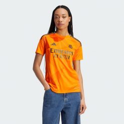 Koszulka Real Madrid 24/25 Away. Brązowe koszulki sportowe damskie Adidas, xs, bez wzorów, z materiału, bez kołnierzyka, bez ramiączek, do piłki nożnej. Za 449.00 zł.