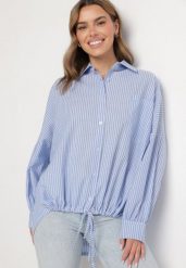 Jasnoniebieska Bawełniana Koszula Oversize w Paski ze Ściągaczem Elineola. Niebieskie bluzki damskie Born2be, uniwersalny, bez wzorów, z bawełny, eleganckie, bez kołnierzyka, bez ramiączek. Za 129.99 zł.