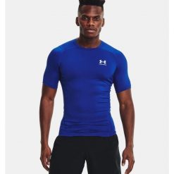 Koszulka termoaktywna męska UNDER ARMOUR 1361518 z krótkim rękawem. Niebieskie koszulki sportowe męskie Under Armour, m, bez wzorów, bez kołnierzyka, bez ramiączek. Za 110.99 zł.