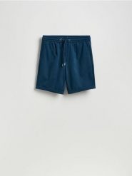 Szorty regular fit - granatowy. Niebieskie szorty męskie Reserved, l, bez wzorów, z dzianiny. Za 99.99 zł.