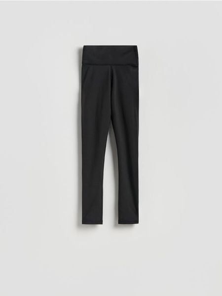 Gładkie legginsy - czarny. Czarne legginsy damskie Reserved, l, bez wzorów, z dzianiny. Za 89.99 zł.