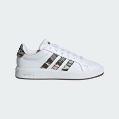 Adidas Junior KI5695 Biały - Tenisówki lifestyle. Białe trampki i tenisówki damskie Adidas, bez wzorów, z materiału, klasyczne, bez zapięcia. Za 160.99 zł.