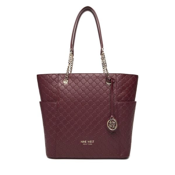 Torebka Nine West. Czerwone torebki do ręki damskie Nine West, bez wzorów, bez dodatków. Za 269.99 zł.