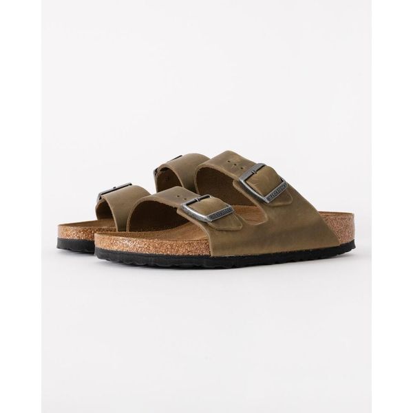 Klapki damskie Birkenstock 1027039. Zielone klapki damskie Birkenstock, bez wzorów, z materiału, bez obcasa. Za 784.00 zł.